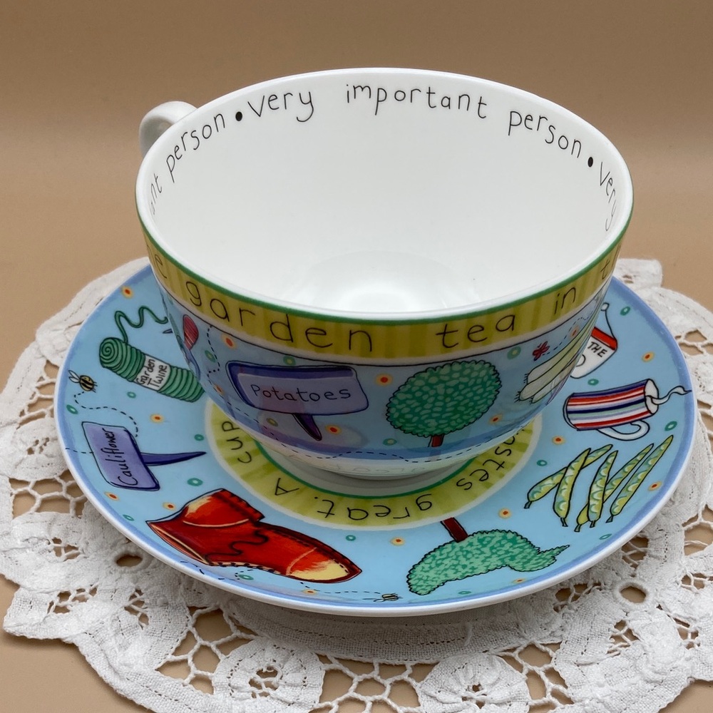 Vintage Royal Worcester "Tea in the Garden" Blue Cup & Saucer